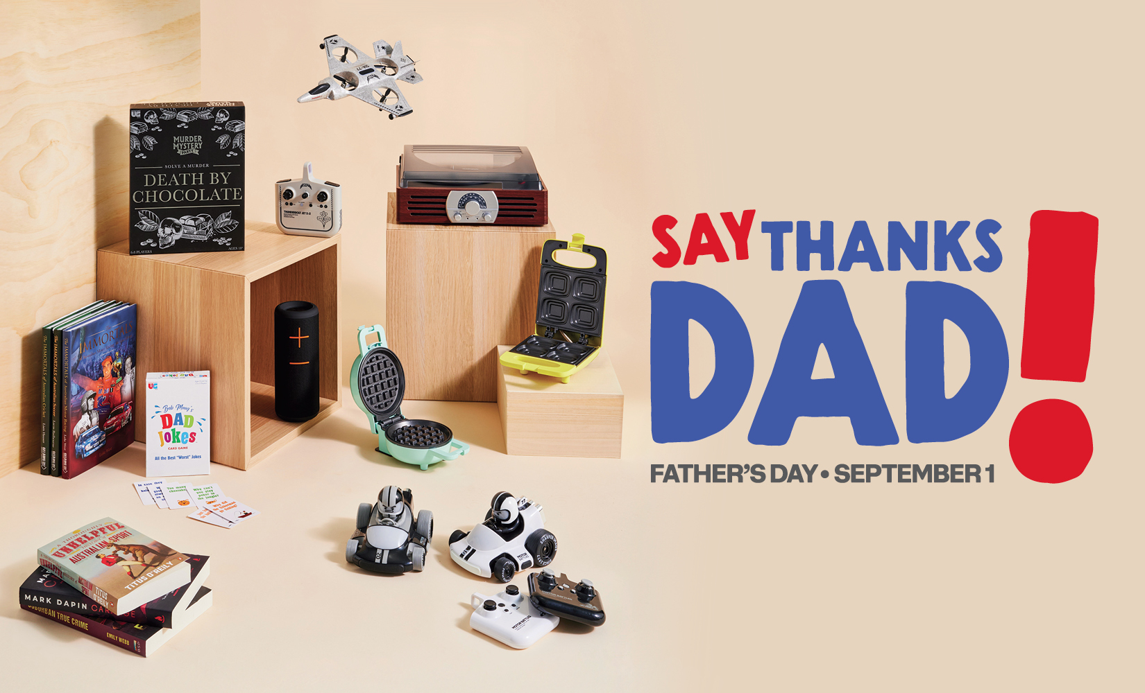 Gadgets and books with 'Say Thanks Dad!' wording